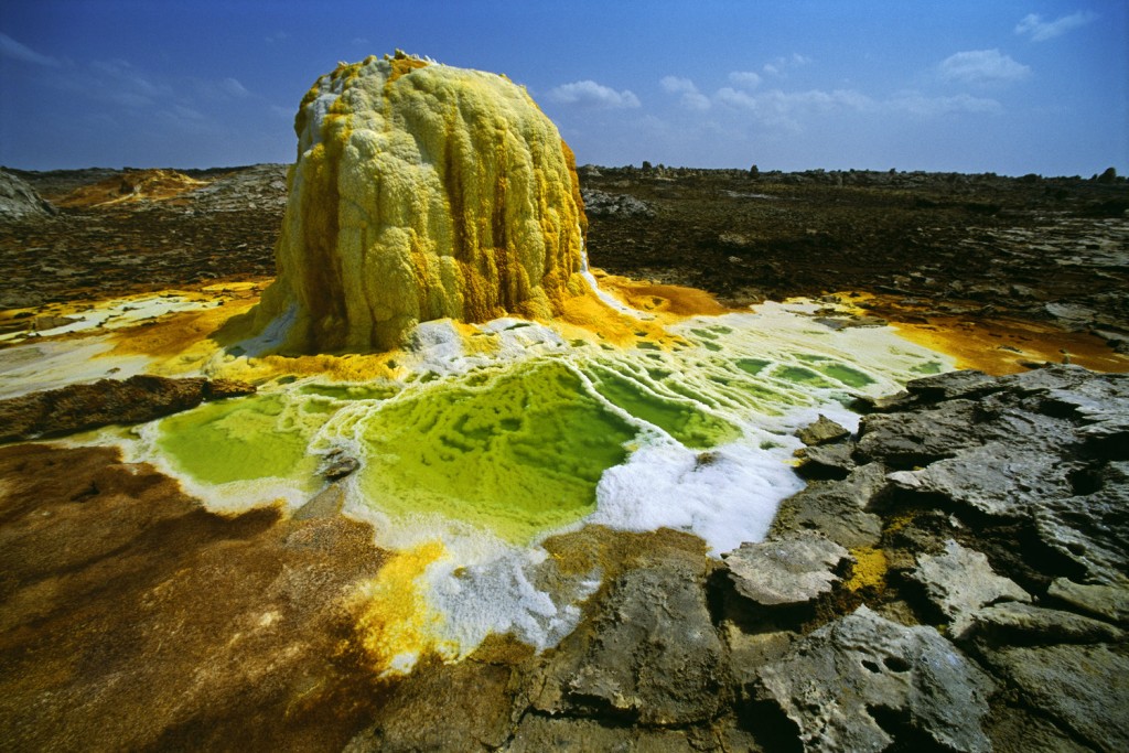 Dallol hydrothermal site, in Ethiopia, is dotted with geyserite mounds formed by the strongly mineralized waters going up through a salt dome.