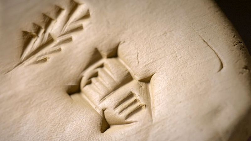 Un pictograma de una espiga junto al de una ubre significaba "hermosa" para los sumerios. La clave: el Principio de Rebus.